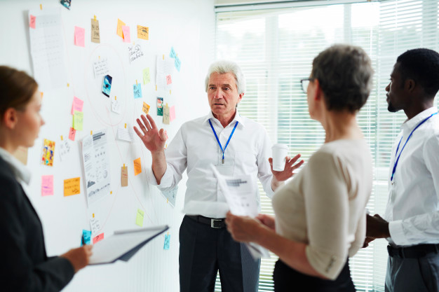 several department managers discussing plans